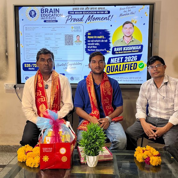 Ravi Kushwah receiving a memento from The Brain Education Institute faculty, Morena